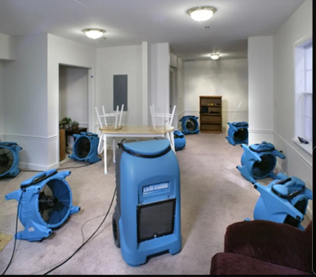 Air movers and dehumidifier setup for Water Damage Restoration in Gypsum